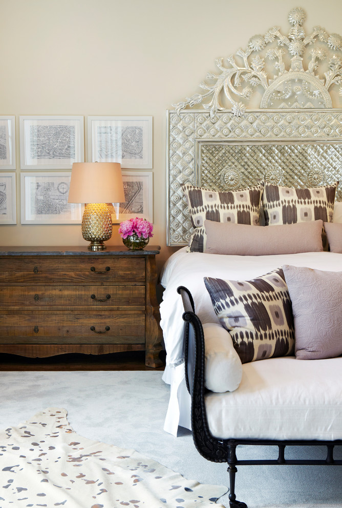 Photo of a classic grey and pink bedroom in New York with beige walls.