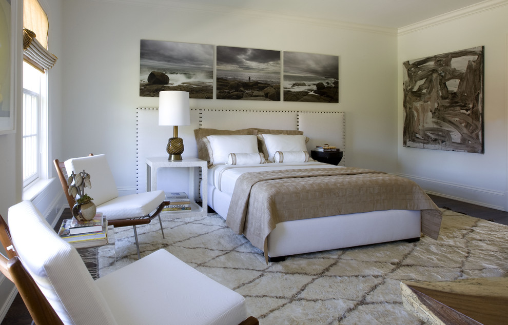 Trendy dark wood floor bedroom photo in New York with white walls and no fireplace