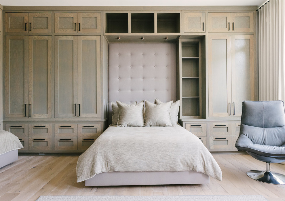 Design ideas for a large classic grey and pink bedroom in Austin with white walls, no fireplace, light hardwood flooring and beige floors.