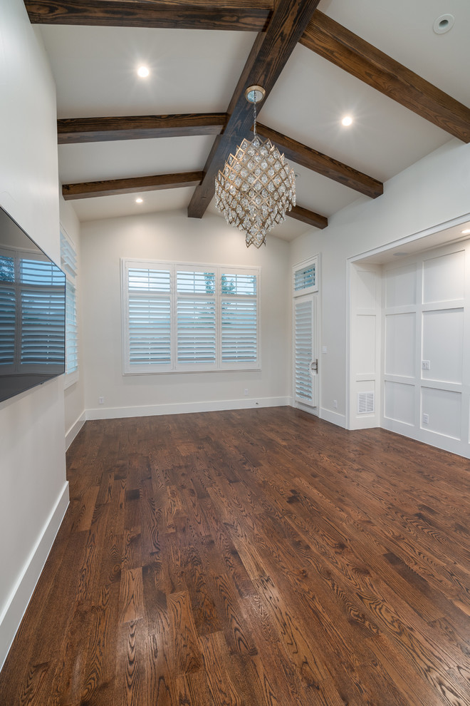 Inspiration for a large transitional master dark wood floor and brown floor bedroom remodel in Dallas with gray walls and no fireplace