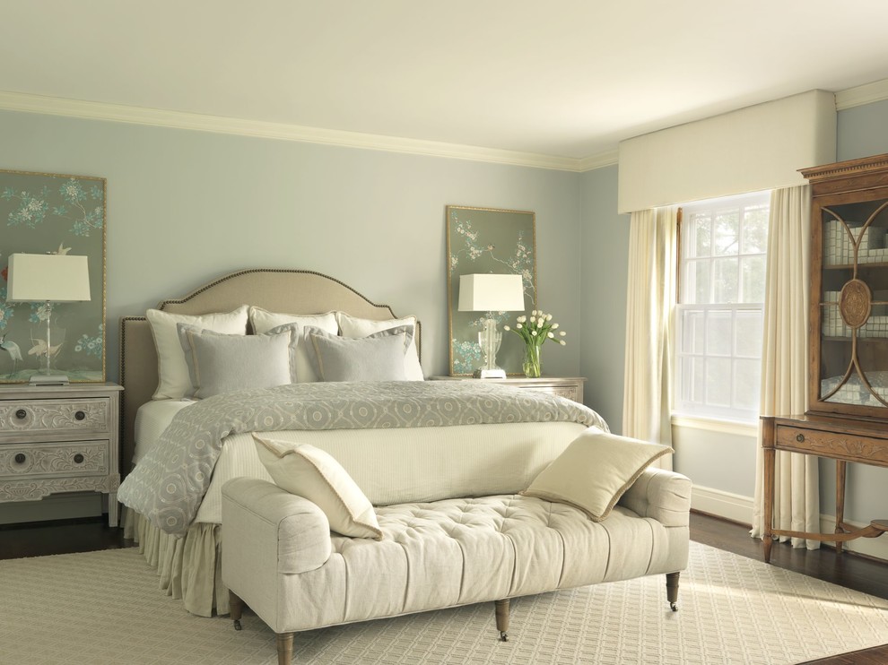 Inspiration for a timeless bedroom remodel in St Louis with blue walls