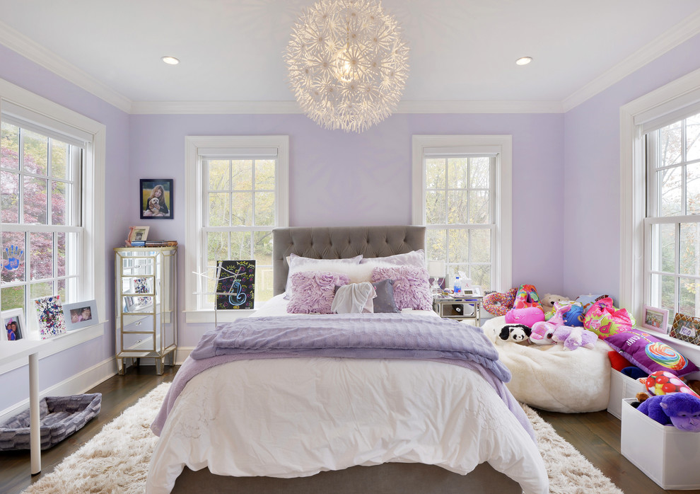 Design ideas for a victorian guest and grey and pink bedroom in New York with purple walls and dark hardwood flooring.