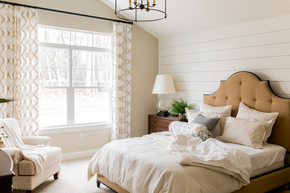 Inspiration for a timeless carpeted and beige floor bedroom remodel in Grand Rapids with white walls
