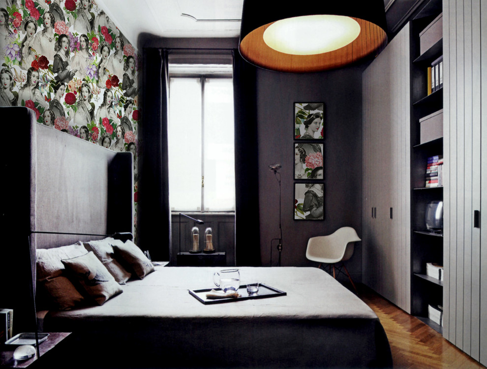 Inspiration for a contemporary bedroom remodel in Kent with red walls
