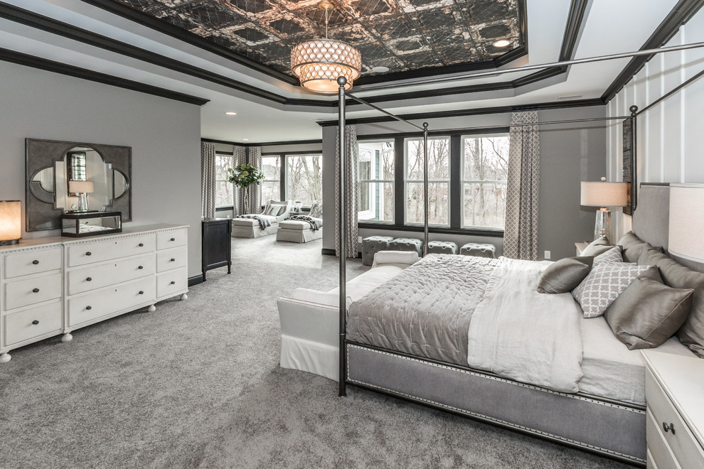 Esempio di un'ampia camera matrimoniale minimal con pareti grigie, moquette e pavimento grigio