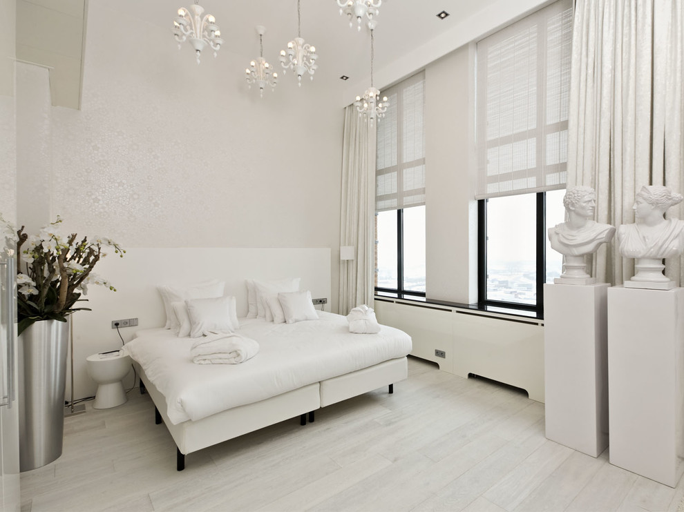 Example of a minimalist white floor bedroom design in San Diego