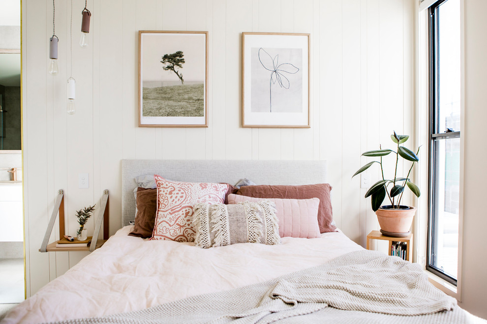 Scandi bedroom in Sunshine Coast with beige walls.
