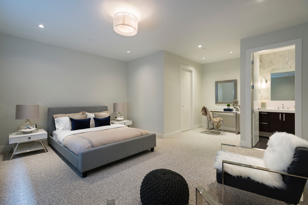 Example of a large trendy master carpeted bedroom design in Vancouver with white walls