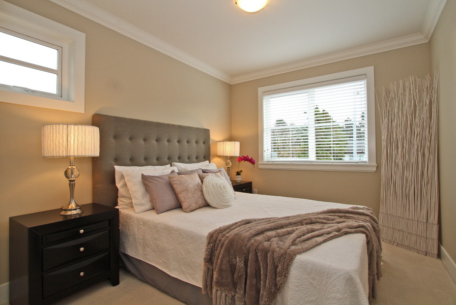 Minimalist bedroom photo in Vancouver