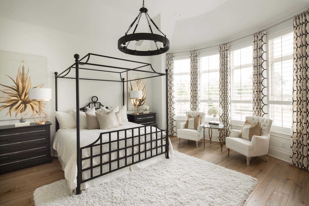 Bedroom - transitional master light wood floor and beige floor bedroom idea in Dallas with white walls and no fireplace