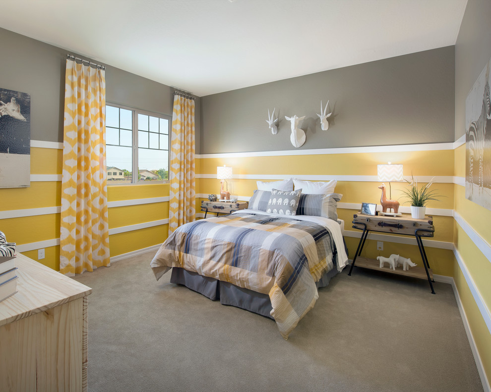 This is an example of a classic grey and yellow bedroom in Phoenix with multi-coloured walls and carpet.