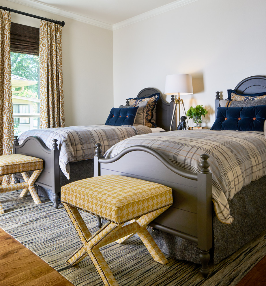 Bedroom - transitional guest medium tone wood floor and brown floor bedroom idea in Los Angeles with white walls and no fireplace