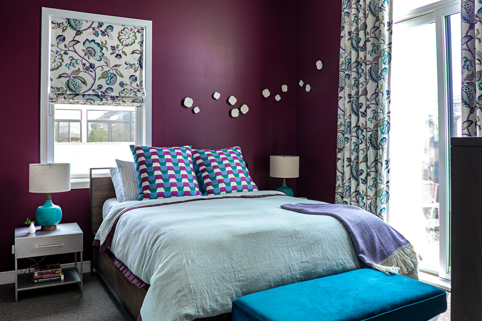 This is an example of a medium sized traditional master bedroom in Chicago with purple walls and carpet.