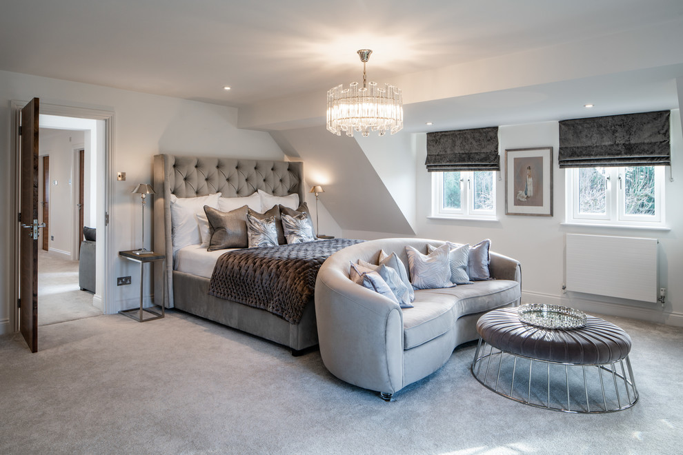 Photo of a classic master and grey and silver bedroom in Kent with grey walls, carpet and grey floors.