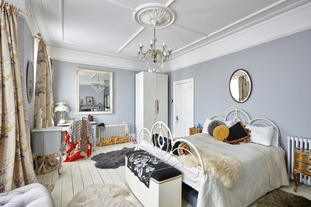 Inspiration for a large victorian master bedroom in London.