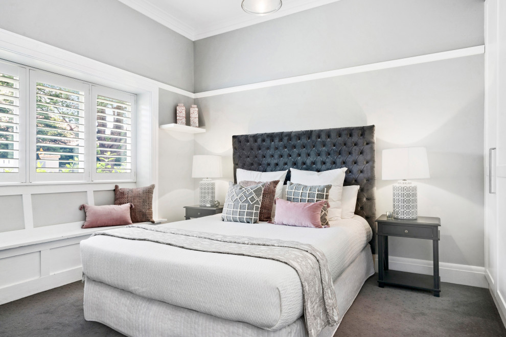 Transitional carpeted and gray floor bedroom photo in Sydney with gray walls
