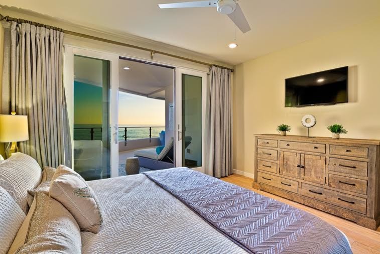 Example of a beach style bedroom design in San Diego