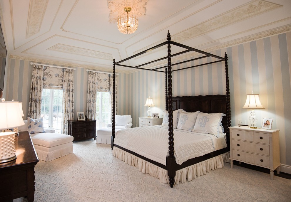 Large elegant master carpeted and beige floor bedroom photo in Other with blue walls and no fireplace