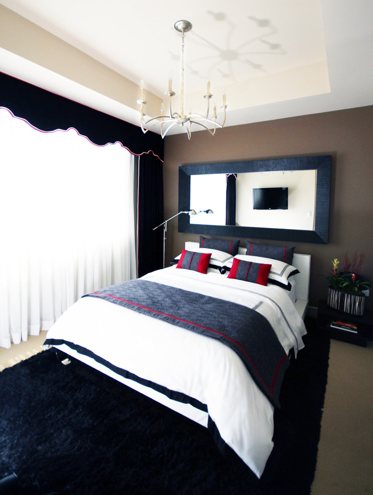 This is an example of a world-inspired grey and silver bedroom in Los Angeles.