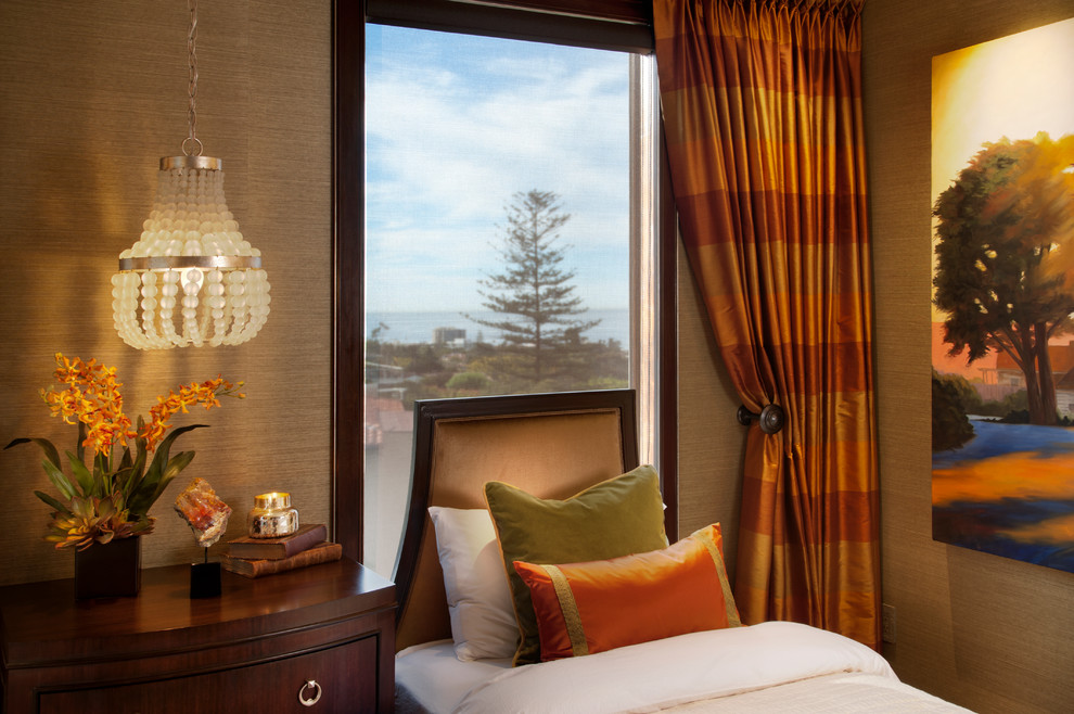 Bedroom - mid-sized traditional guest carpeted bedroom idea in San Diego with brown walls and no fireplace