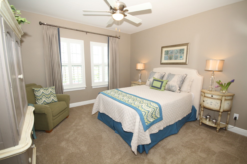 Bedroom - mid-sized coastal guest carpeted bedroom idea in Orlando with beige walls