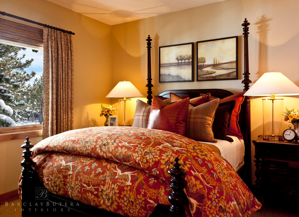 Design ideas for a rustic guest bedroom in Orange County with beige walls and carpet.