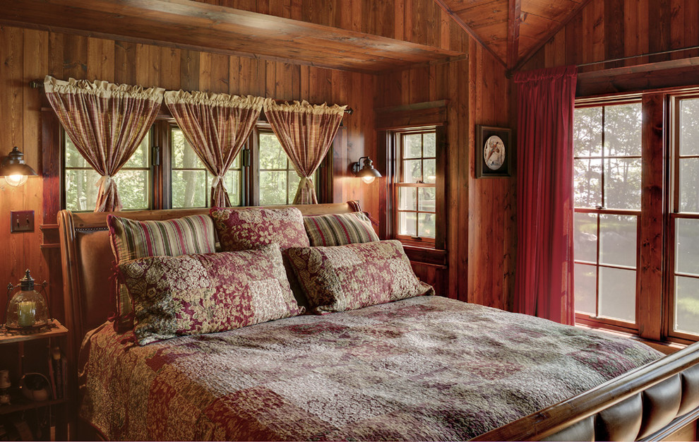 Photo of a rustic bedroom in Minneapolis.