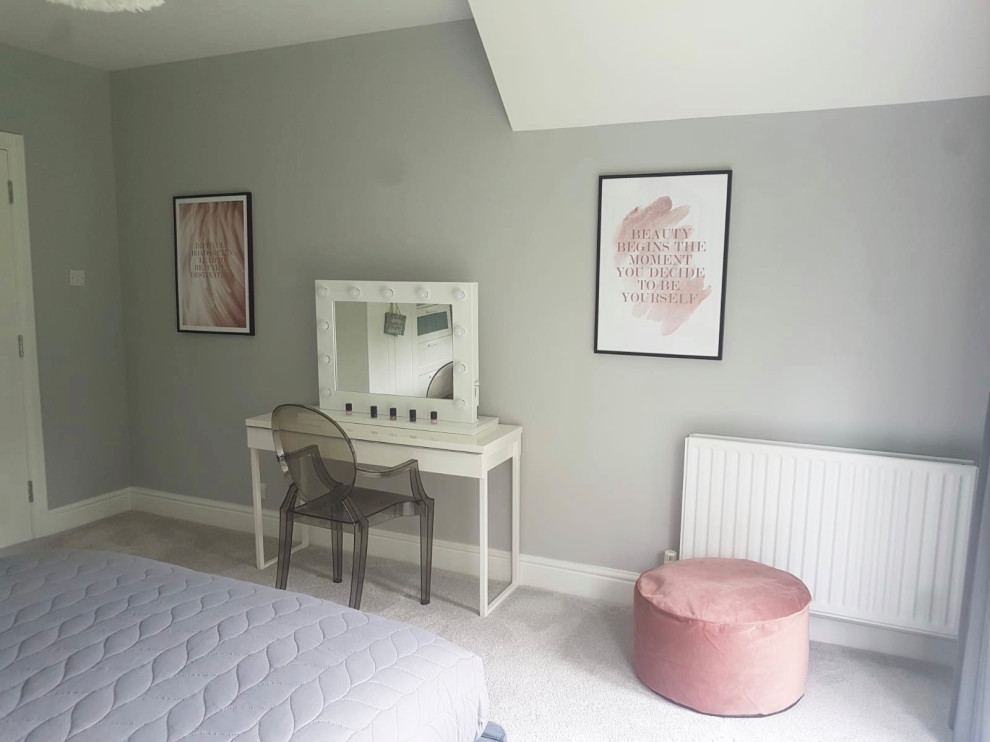 Design ideas for a large scandinavian guest and grey and pink bedroom in Hertfordshire with grey walls, carpet and grey floors.