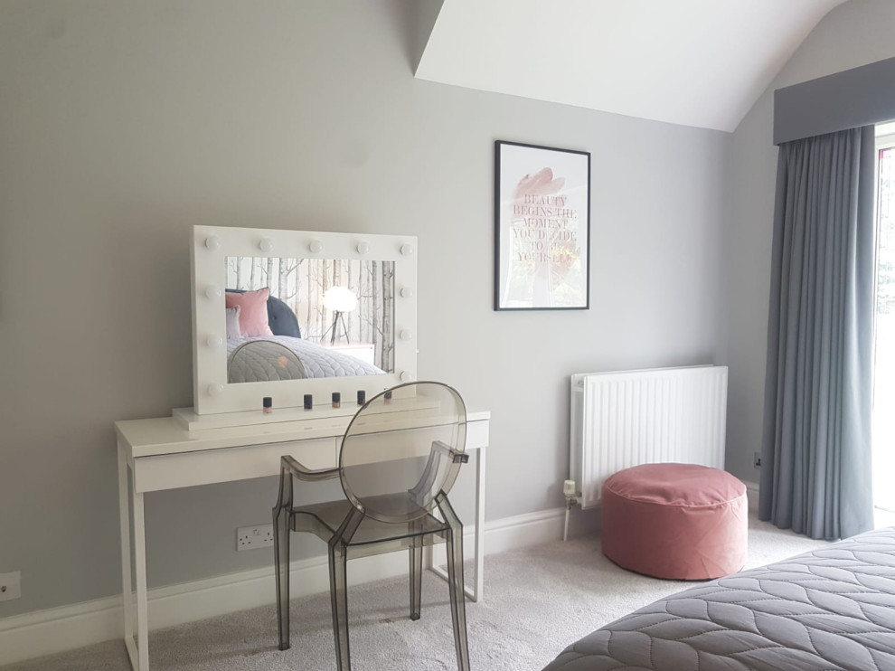 Design ideas for a large scandinavian guest and grey and pink bedroom in Hertfordshire with grey walls, carpet and grey floors.