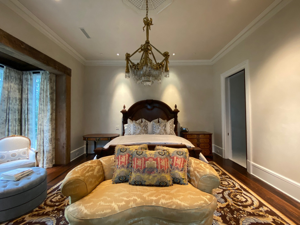 Inspiration for an expansive guest bedroom in Houston with a stone fireplace surround and a vaulted ceiling.