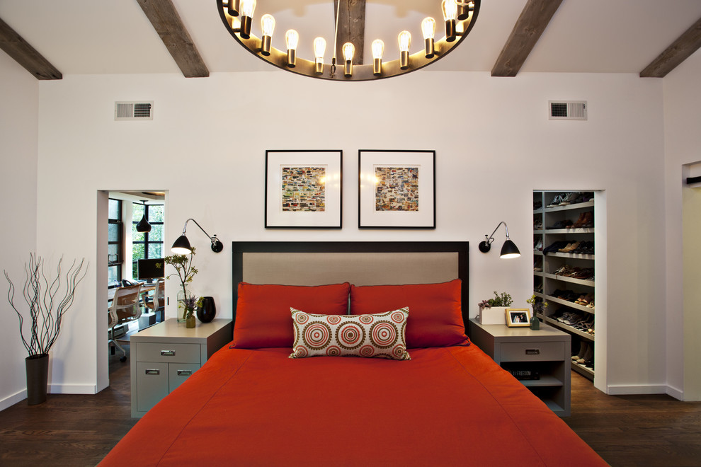 Inspiration for a large contemporary bedroom in San Francisco with white walls and dark hardwood flooring.