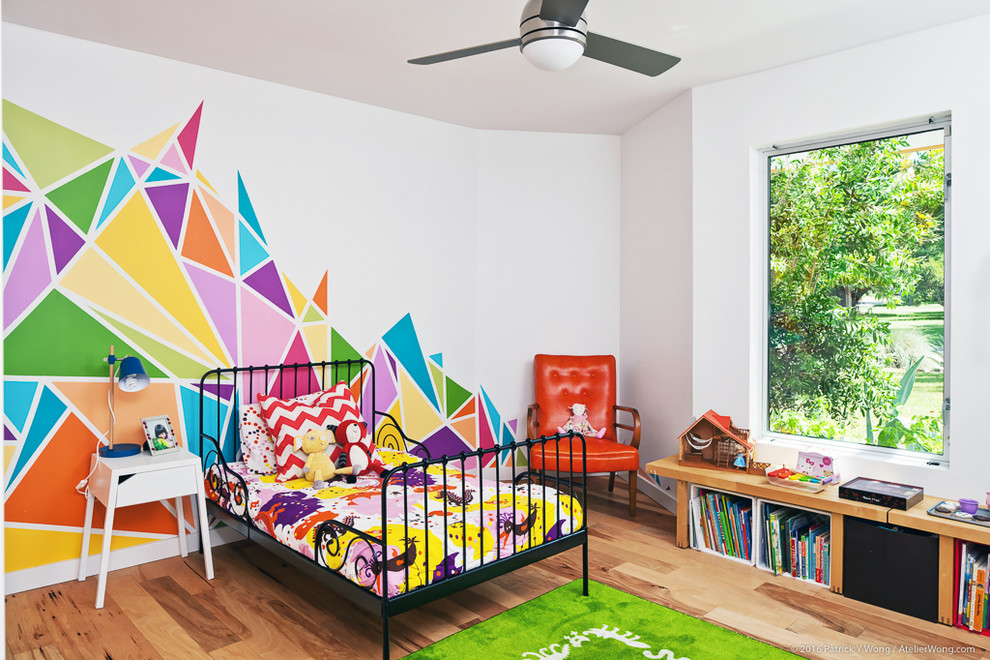 Inspiration for a contemporary guest light wood floor bedroom remodel in Austin