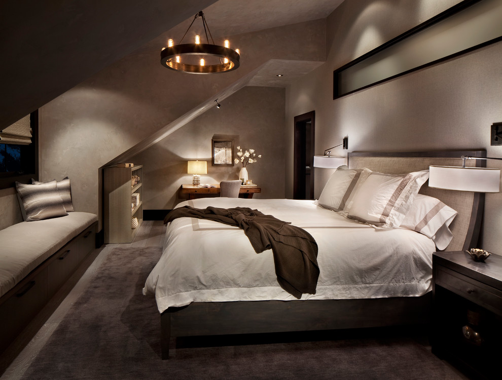 This is an example of a contemporary grey and brown bedroom in New York with grey walls and no fireplace.