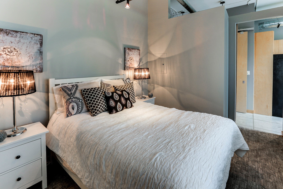 Example of a small urban guest carpeted bedroom design in Toronto with gray walls