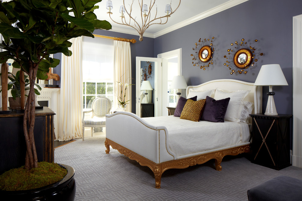 Example of a mid-sized island style master carpeted bedroom design in New York with gray walls