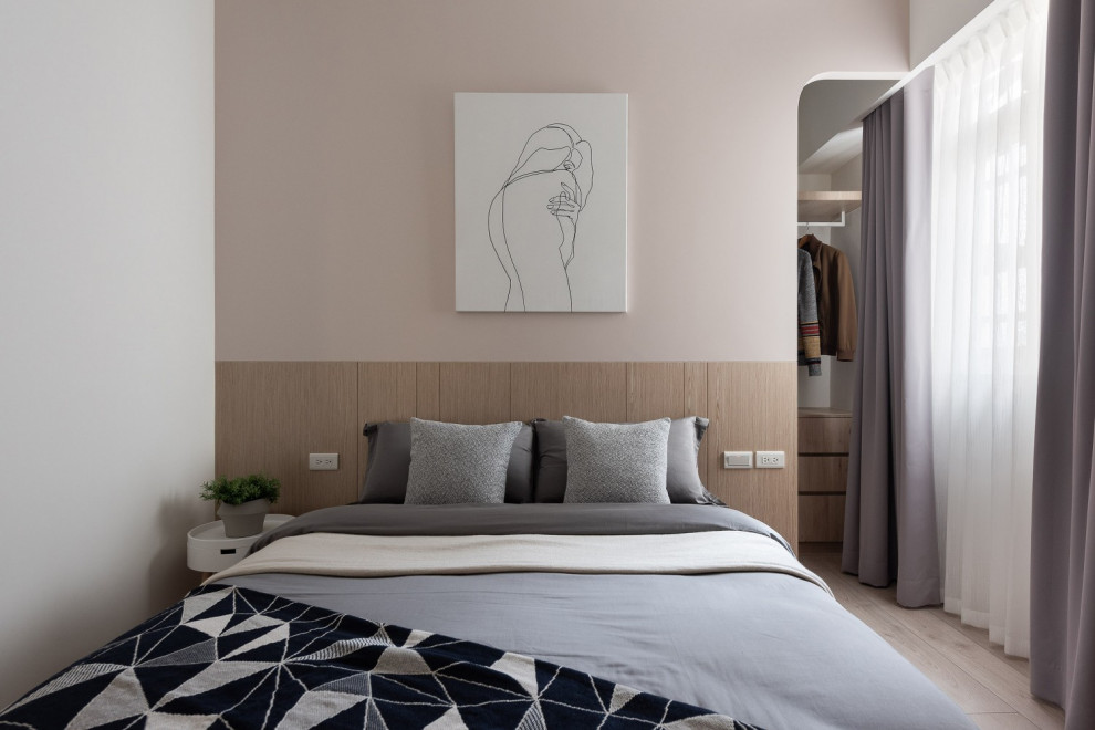 This is an example of a medium sized contemporary grey and pink bedroom in Other with multi-coloured walls and beige floors.