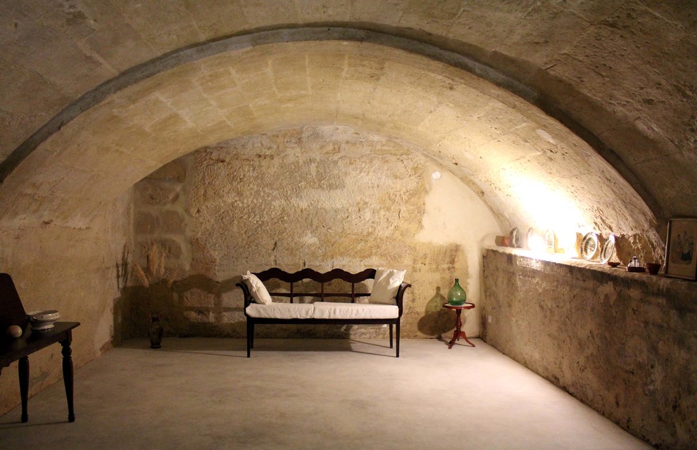 This is an example of a medium sized classic wine cellar in Barcelona.