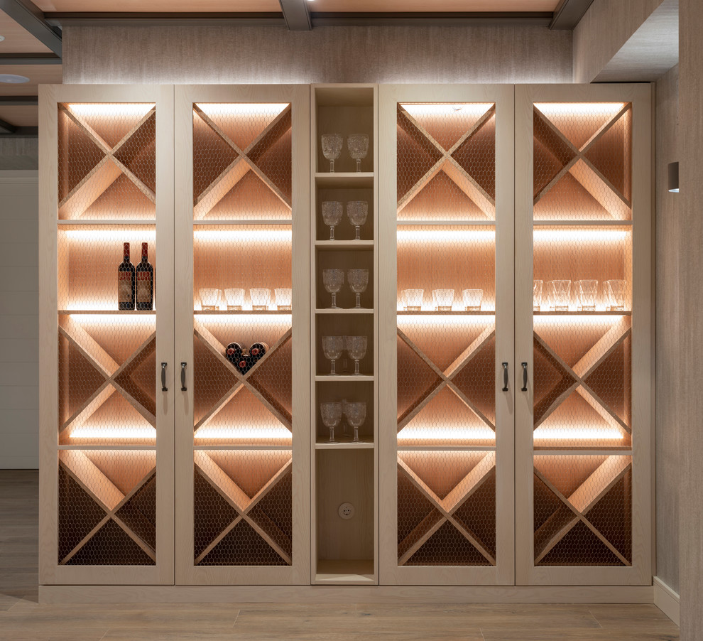 Large traditional wine cellar in Bilbao with porcelain flooring, cube storage and brown floors.