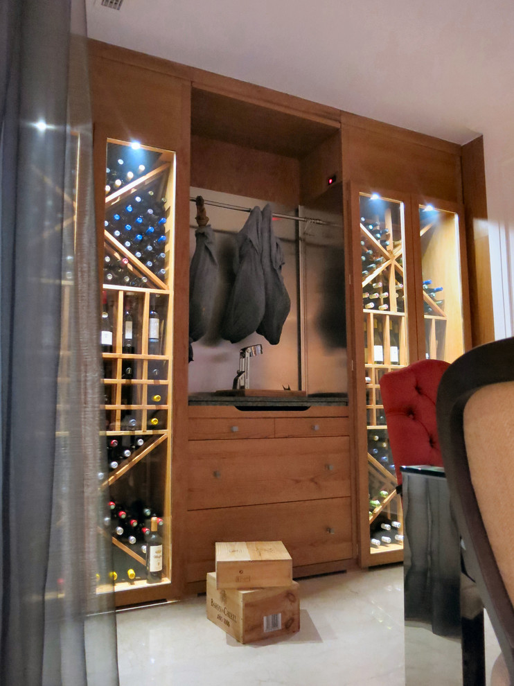 Photo of a medium sized contemporary wine cellar in Madrid with storage racks.