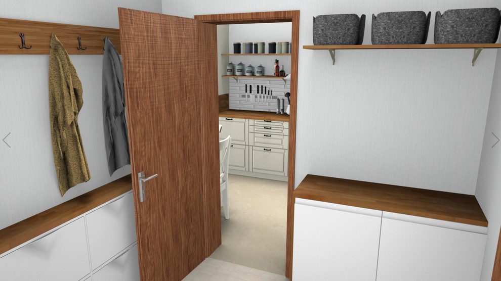 This is an example of a small rural utility room in Copenhagen with flat-panel cabinets, wood worktops, white walls, ceramic flooring, a side by side washer and dryer and beige floors.