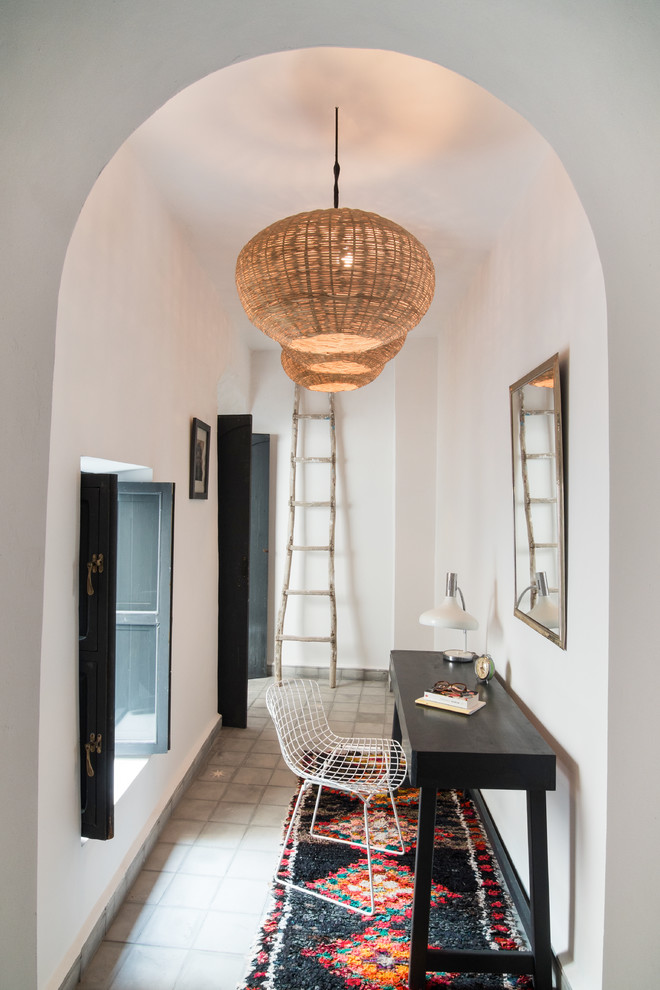 Tuscan freestanding desk gray floor study room photo in Marseille with white walls