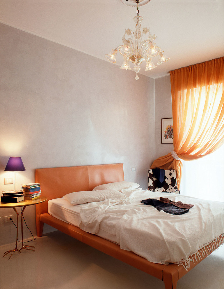 Idee per una camera da letto contemporanea con pareti grigie