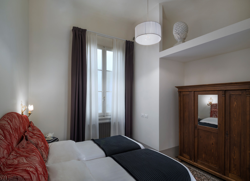 Inspiration for a mediterranean bedroom remodel in Florence