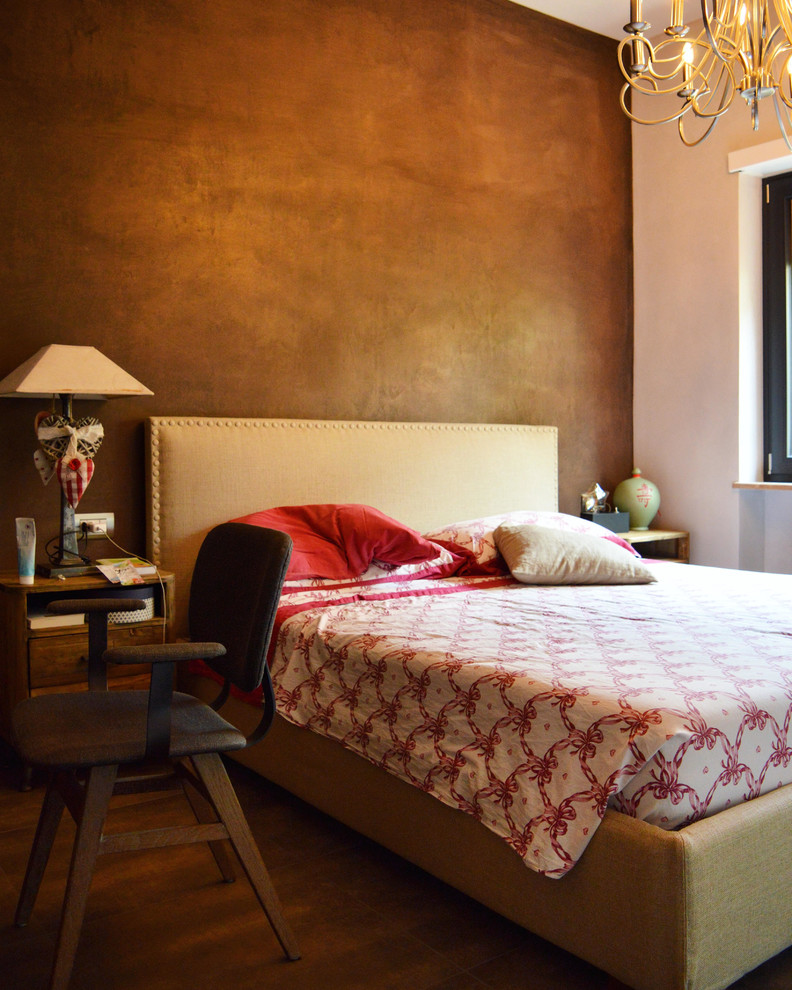 ローマにあるエクレクティックスタイルのおしゃれな寝室のインテリア