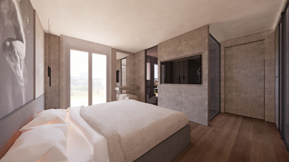 Foto di una camera da letto stile loft industriale di medie dimensioni con pareti grigie, parquet chiaro e pavimento marrone