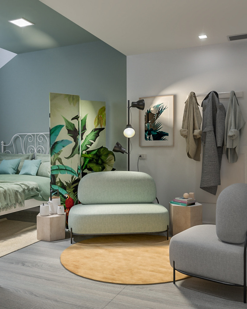 ミラノにある小さなコンテンポラリースタイルのおしゃれなロフト寝室 (緑の壁、磁器タイルの床、グレーの床)