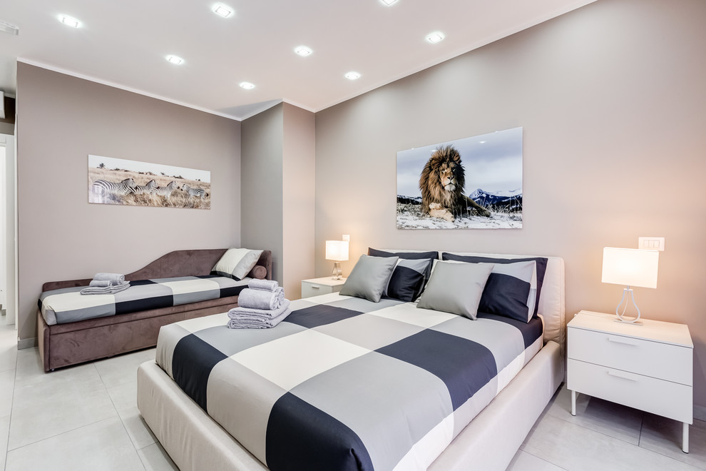 Design ideas for a medium sized contemporary guest bedroom in Rome.