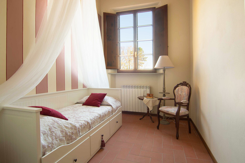 Example of a country bedroom design in Florence
