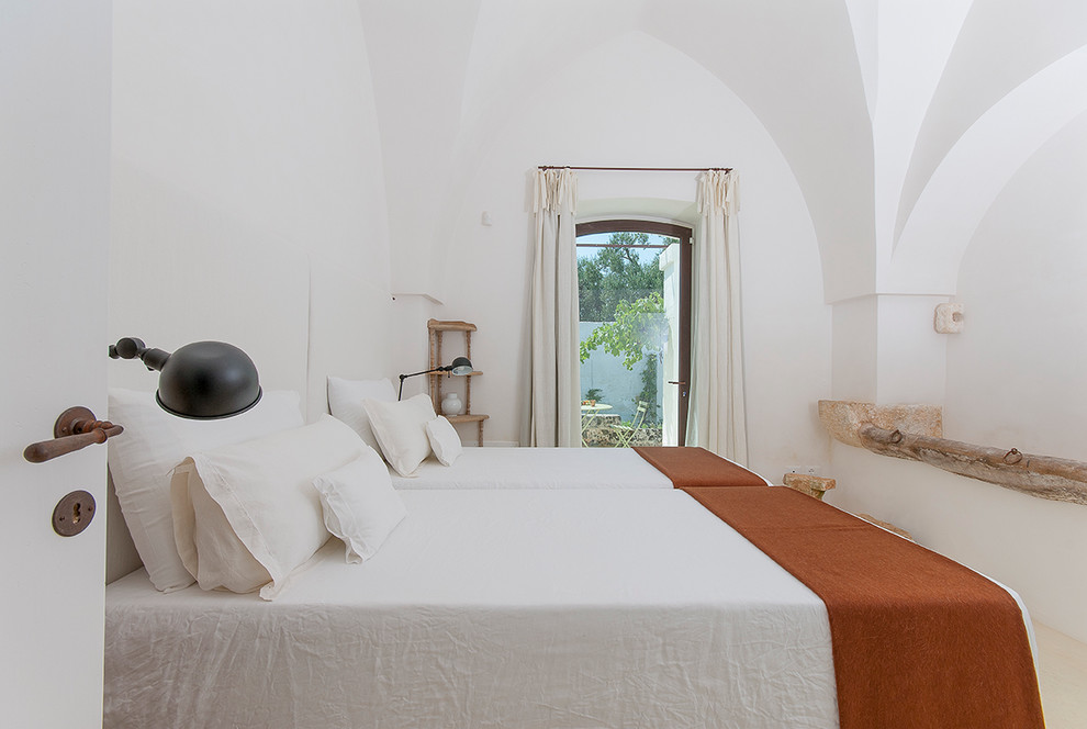 Example of a tuscan bedroom design in Bari