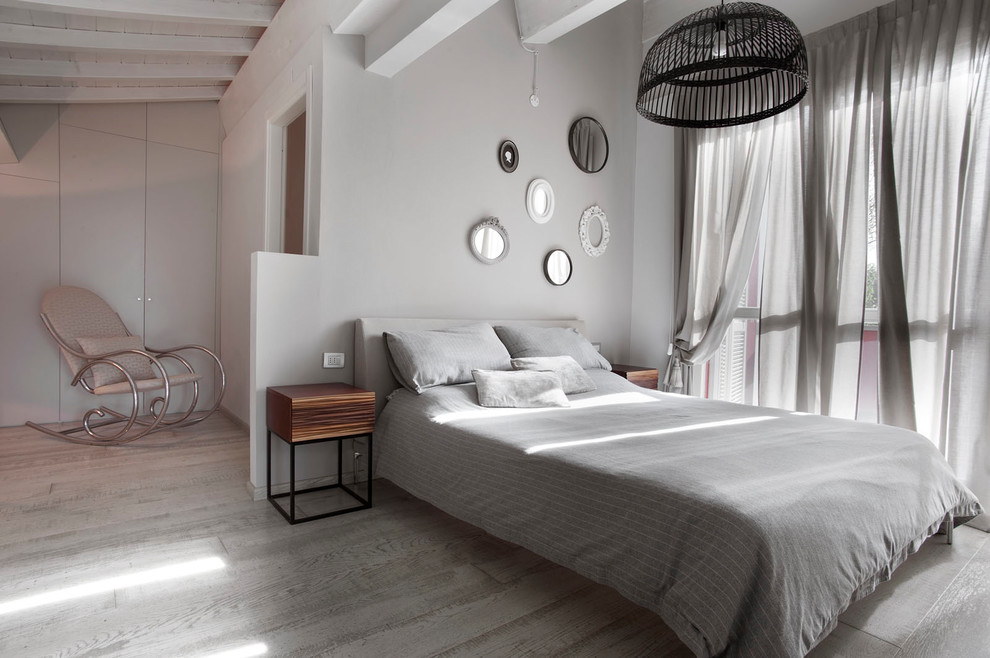 Inspiration for a contemporary bedroom remodel in Florence